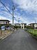 外観：対象地東側の前面道路６M幅員を撮影