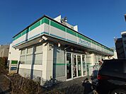 ファミリーマート彩都粟生南店 318m