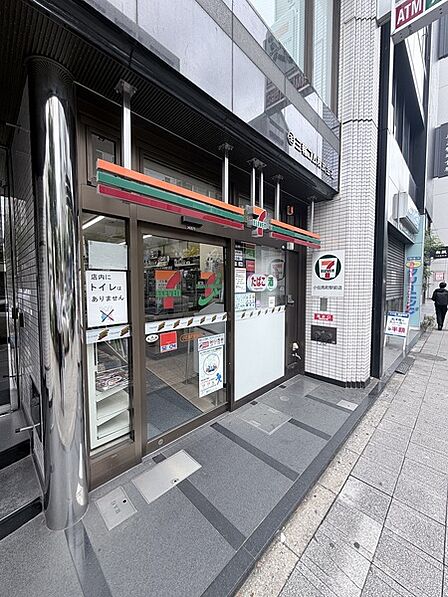 セブンイレブン小伝馬町駅前店(約100m)
