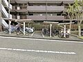 雨から自転車を...