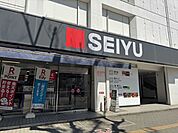 西友新所沢店 90m
