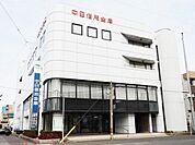 銀行「中日信用金庫栄生支店まで502m」