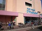万代尾崎店まで1、009ｍ