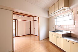 伊予鉄道横河原線 久米駅 徒歩1分の賃貸マンション 1階2LDKのリビング/ダイニング