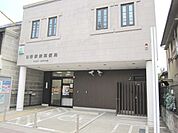 日野駅前郵便局 612m