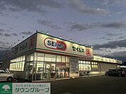 ドラッグセイムス吉川さくら通り店 徒歩5分。 380m