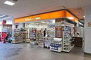 ファミリーマートトモニー入間市駅店 163m