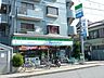 周辺：ファミリーマート国立西二丁目店 698m