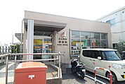 秋山駅前郵便局まで450ｍ