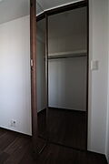 キッチン横の洋室のウォークインクローゼット