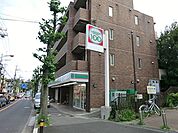 ローソンストア100読売ランド前店まで474m