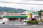 業務スーパーTAKENOKO上牧店まで548m