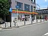 周辺：デイリーヤマザキ上牧駅前店まで327m