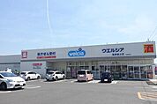 ウエルシア佐野植上店まで634m
