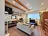 リビング/ダイニング：アイアン×無垢材のキッチンや屋根から1階までを通る吹き抜けなどこだわりが詰まった住まいです