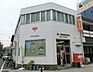 周辺：港八幡屋郵便局まで670m
