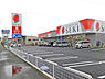 周辺：ドラッグストアセキ脚折町店まで1040m