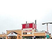 丸善守山店まで573m