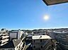 その他：建物越しに市街地を望む眺望