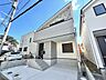 外観：白とグレーを基調とした戸建て外観