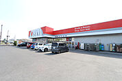 ドラッグストアセキ大袋店まで713m