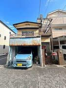 【外観】昭和46年3月築木造瓦葺2階建て物件※ＡＩ加工により天候を青空に変更しております。