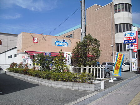 ウエルシア箕面西小路店まで208m