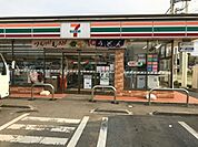 セブンイレブン谷和原インター店まで1276m