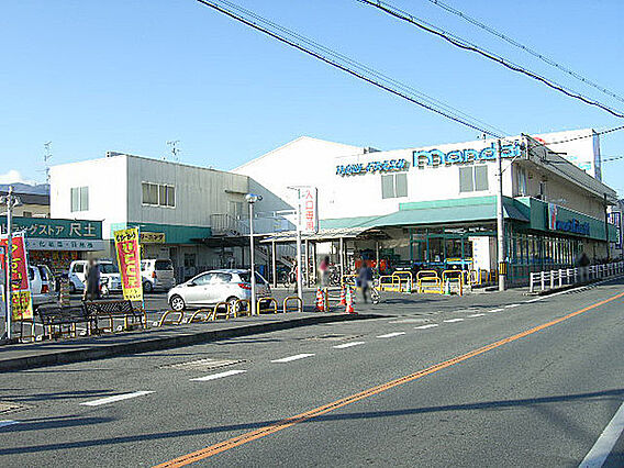 万代尺土店まで...