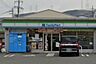 周辺：ファミリーマート　柏原田辺一丁目店まで594m