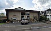 ダルマピザまで938m、雑貨も入っているピザ屋さん