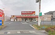 ツルハドラッグ愛知川店まで約2,810m 