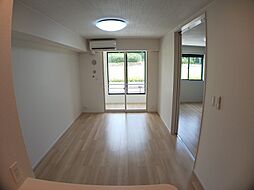 ウッドスクエアIII　Ａ棟 102 1階1LDKのリビング/ダイニング