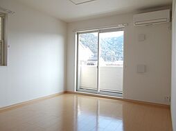 グロース・ヴァルト　Ａ 103 1階2DKのリビング/ダイニング