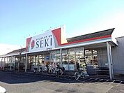 【ドラッグストア】ドラッグストアセキ清門町店まで900ｍ