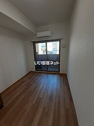 リフレスロイヤルシティIV 702 7階ワンルームのリビング/ダイニング