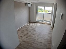 メリディアン多賀城笠神壱番館 203 2階1LDKのリビング/ダイニング