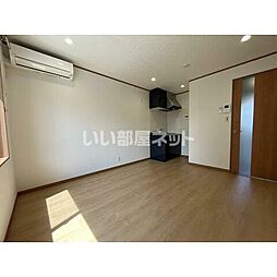 レントハウスＦＵＳＳＡ860 106 1階ワンルームのリビング/ダイニング