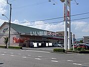【スーパー】マルヨシセンター 　松縄店まで611ｍ
