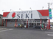 【ドラッグストア】ドラッグストアセキ 藤の牛島店まで695ｍ