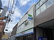 【コンビニエンスストア】ファミリーマート 薬ヒグチ弥刀駅前店まで1062ｍ