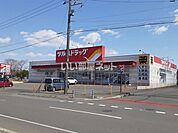 【ドラッグストア】ツルハドラッグ明徳店まで464ｍ