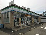 【コンビニエンスストア】ファミリーマートうぬま朝日町店まで950ｍ