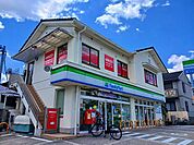 【コンビニエンスストア】ファミリーマート 向日洛西口店まで550ｍ