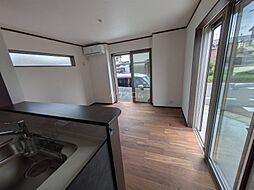 高坂2丁目貸家 1 1階4LDKのリビング/ダイニング