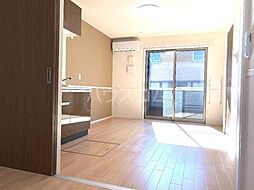 アクロスモモ 1階1LDKのリビング/ダイニング