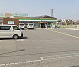 【コンビニエンスストア】ファミリーマート 門真上島町店まで393ｍ